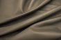 Close up of taupe pigmented upholstery leather 