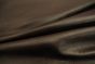 Close up of rich dark brown pigmented upholstery leather
