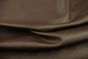 Close up of rich dark brown pigmented upholstery leather