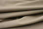 Picture of draping Morning Khaki, soft leather fabric for upholstery and furniture.