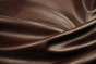Close up of chocolate brown full grain leather for upholstery