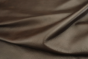 Close up picture of warm chocolate brown top grain upholstery leather