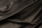 Close up of espresso brown full grain distressed upholstery leather
