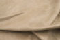 Close up of warm tan semi aniline upholstery leather