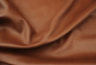 Picture of draping Baker’s Rum, cognac genuine cowhide leather for upholstery