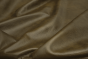 Closeup picture of Dirty Martini soft, olive green colored upholstery leather for furniture