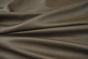 Close up picture of warm multitone grey top grain leather for upholstery