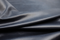 Closeup picture of Blue Note, navy blue top grain leather for sofas, chairs, and other furniture upholstery
