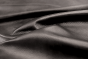 Closeup picture of Midnight Train, dark grey top grain leather for sofas, chairs, and other furniture upholstery