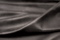 Closeup picture of Midnight Train soft, dark grey colored upholstery leather for furniture