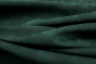 Picture draping deep green colored nubuck fabric for use in apparel