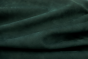 Deep green colored nubuck material for use in upholstery