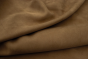 Picture draping olive colored nubuck fabric for use in apparel
