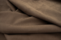 Closeup picture of soft taupe nubuck showing the texture of leather