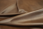 Close up picture of tobacco brown full grain leather hide for upholstery