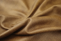 Close up of tan with dark brown highlights pebble grain leather for upholstery