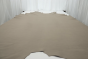 Picture of medium grey full grain upholstery leather displayed on a table