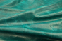 Close up picture of aquamarine pull up upholstery leather