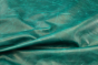 Close up picture of aquamarine pull up upholstery leather