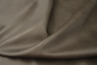 Close up of multi tone medium grey full grain leather for upholstery
