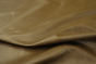 Close up picture of multitone olive semi-aniline upholstery leather