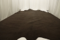 Picture of rich dark brown full grain leather for upholstery displayed on a table
