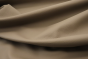 Close up picture of grey taupe Italian upholstery leather