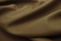 Close up of warm mocha pigmented upholstery leather