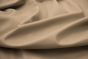 Close up of warm sand Italian upholstery leather