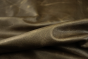 Close up picture of dark brown pull up upholstery leather