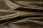 Close up picture of dark brown pull up upholstery leather