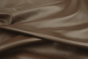Close up of rich dark brown full grain upholstery leather