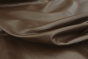 Close up of rich dark brown full grain upholstery leather
