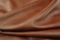 Close up of rich multi tone brandy full grain upholstery leather