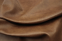 Close up picture of multitone medium brown semi aniline upholstery leather
