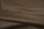 Close up of dark brown multitone Italian upholstery leather