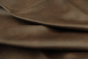 Close up of dark brown multitone Italian upholstery leather