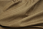 Close up of taupestone semi-aniline leather for upholstery