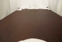 Picture of a rich multitone cigar brown Italian upholstery leather displayed on a table