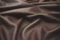 Close up picture of dark brown pigmented leather for upholstery 