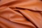 Picture showing the characteristics of an orange Italian leather hide