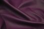 Close up picture of purple leather for upholstery
