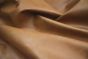 Close up picture of light brown aniline leather for upholstery