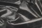 Close up of rich black distress natural grain upholstery leather
