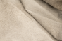 Close up of white with darker accents hair on upholstery leather