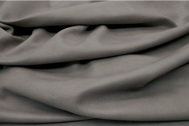 Closeup picture of Gun Smoke soft, grey colored upholstery leather for furniture