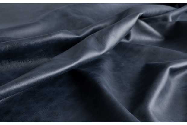 Close up of navy blue aniline dyed upholstery leather