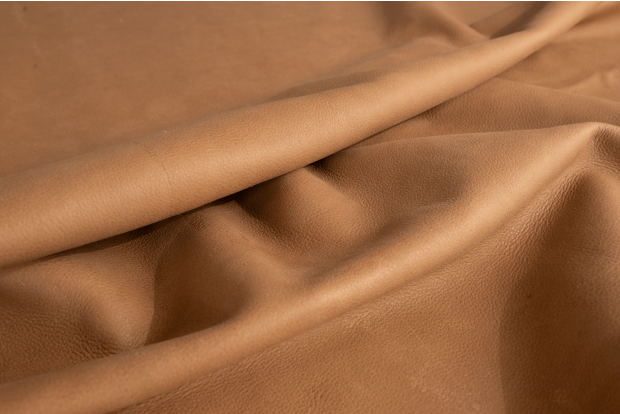Close up of golden tan full grain upholstery leather