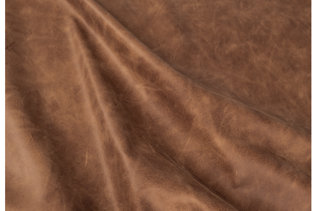 Close up of rich brown multitone distress upholstery leather