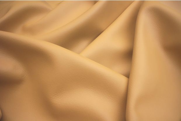 Picture of Gold nappa leather for upholstery showing smooth grain